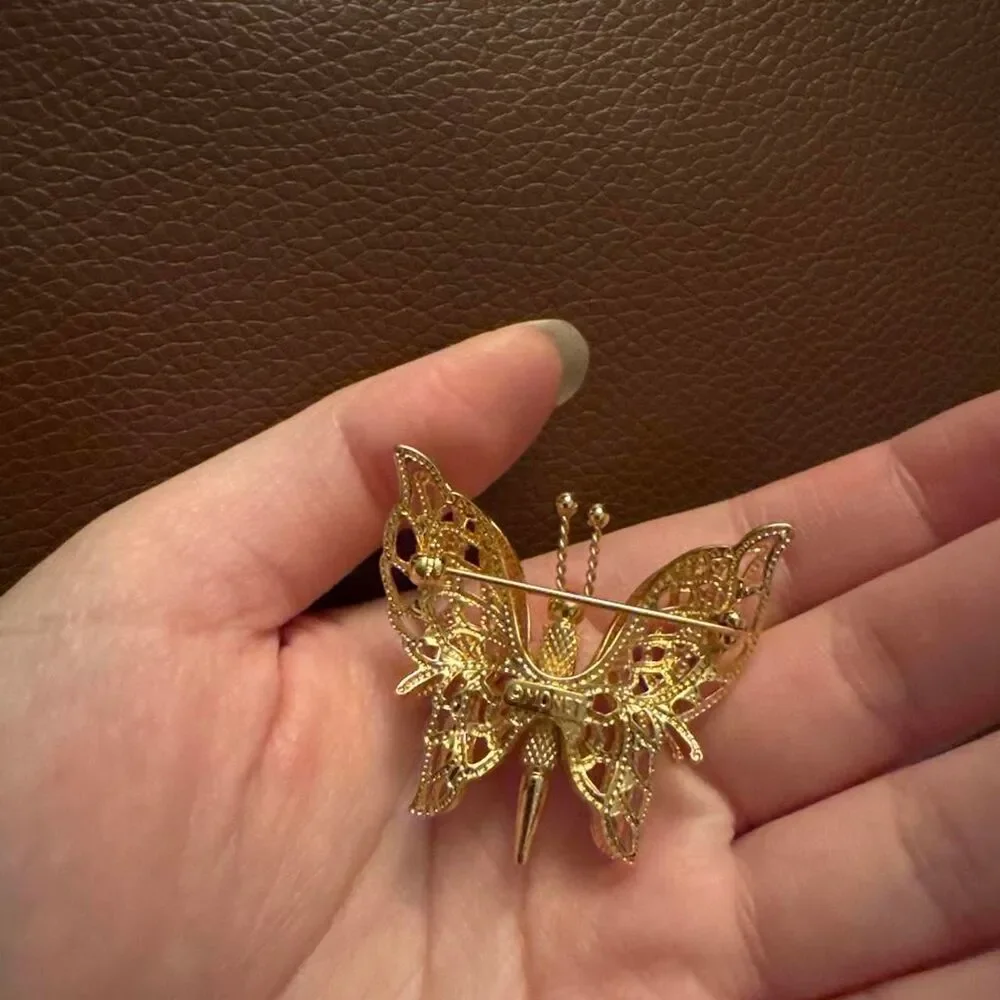 Source Unknown gold butterfly